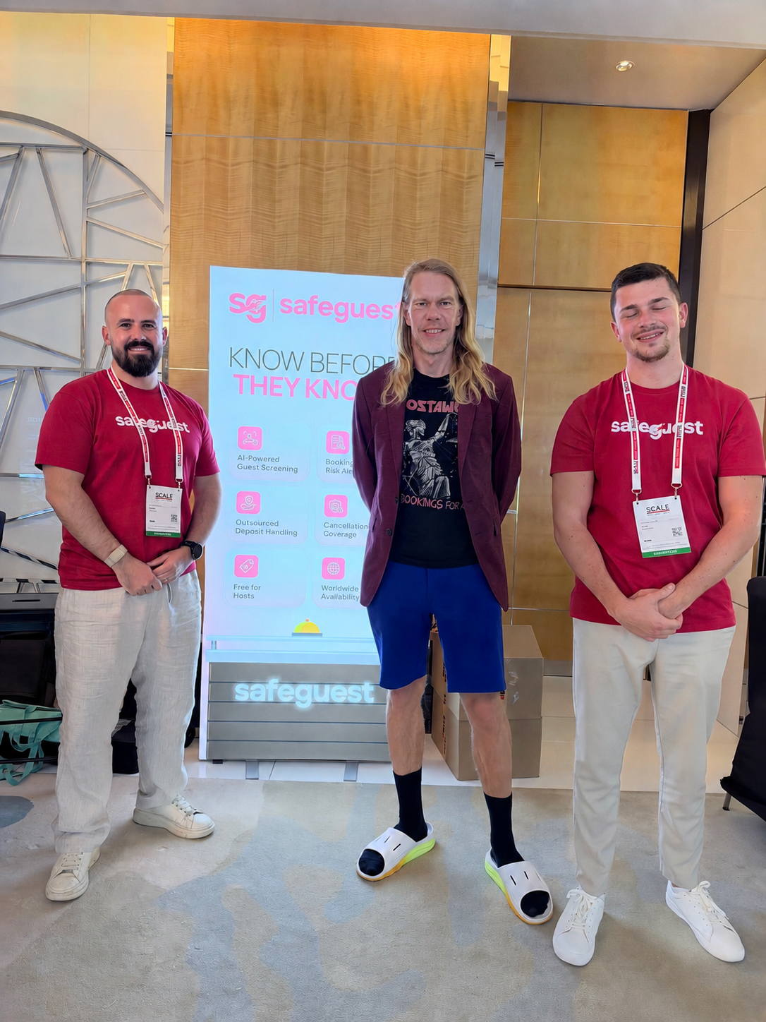 The Safeguest team with their roller banner at SCALE Middle East in Dubai.